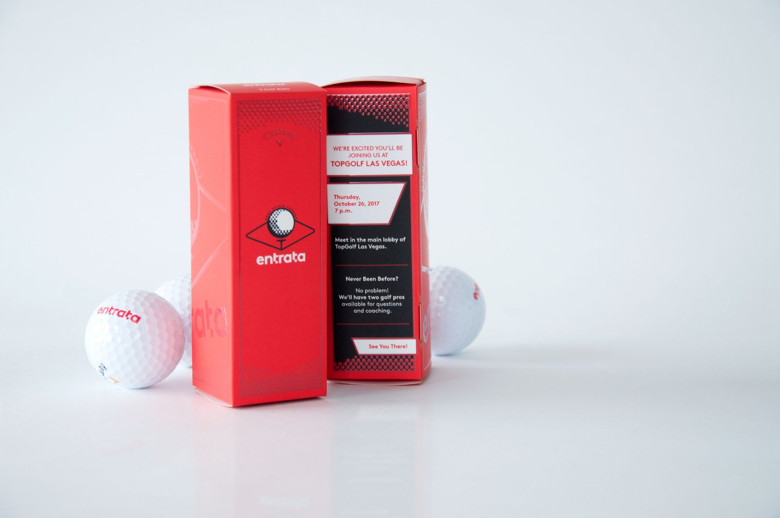 Entrata golf invitation and branded golf balls